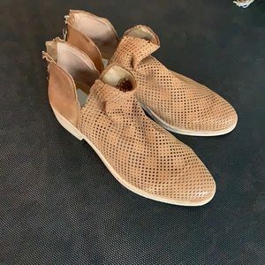 Tan-brown patterned booties by Dolce Vita